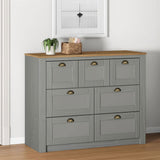 IDIMEX Commode Chambre Bolton L 110 cm en Bois Massif Gris et Brun 7 tiroirs Meuble de Rangement Adulte Buffet Pratique Style Campagne Classique avec Poignets Coquille en métal Coloris Bronze